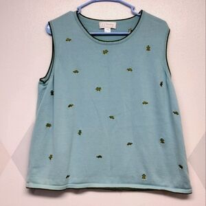 C.J. Banks light blue sweater vest with all over green embroidered turtles 1X